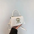 White vintage square shoulder bag with gold RR buckle and adjustable strap - White