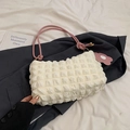 White bubble textured shoulder bag with pink knot straps and flower charm detail - White and Pink