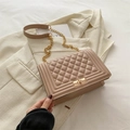 Quilted beige shoulder bag with gold chain strap and metallic clasp on blazer - Khaki