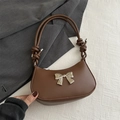 Brown matte leather shoulder bag with silver bow ornament and knotted woven handle - Brown