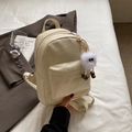 Minimalistischer cremeweißer PU-Lederrucksack mit geometrischen Nähten und Anhänger - Mit Anhänger / Cremeweiß