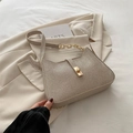 Champagne glitter crescent shoulder bag with cat ear silhouette and gold twist lock - Gold