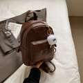 Brauner Mini-Rucksack aus Leder mit geometrischem Patchwork und Plüsch-Anhänger - Mit Anhänger / Kaffeebraun