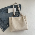 Beige woven straw tote bag with white leather straps and gold metal ring hardware - Off White
