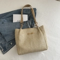 Beige straw tote bag with brown leather straps and fashion patch for summer beach style - Khaki