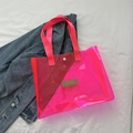 Neon pink transparent PVC tote bag with matching handles and stylish brand patch - Rose Pink