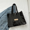 Black high-gloss transparent PVC tote wash bag with leather label and snap button - Black
