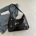 Black glossy eel texture tote bag with silver butterfly charms and Y2K aesthetic - Black
