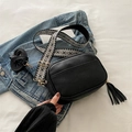 Black lychee leather crossbody bag with geometric embroidery wide strap and tassels - Black