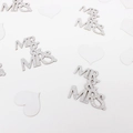 Detail of silver glitter MR & MRS wedding confetti with decorative white heart cutouts - Silver Mr&Mrs and White Hearts