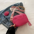 Rose red lychee pattern crossbody camera bag with geometric wide strap and tassel detail - Rose Pink