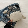 White litchi pattern camera bag with geometric wide strap and tassel detail - White