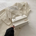 Minimalist white textured crossbody handbag with golden hardware and round top handle - White