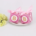 Pink gender reveal candy box with letter B design and a decorative silk bow accent - Pink