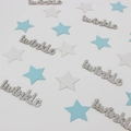 Close-up of silver glitter twinkle letters and blue star confetti for party DIY decor - Silver With Blue White Stars