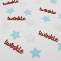 Close-up of red glitter twinkle letters and star confetti for baby shower party decor - Rose Gold With Blue White Stars