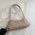 Bolso baguette minimalista albaricoque para mujer con lazo plateado y asa larga - Caqui