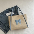 Large straw tote bag in light beige with blue butterfly patch and blue PU handles - Blue