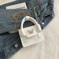 Elegant white ballet-style mini handbag with gold butterfly accent and chain strap - White