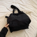 Large black casual tote bag with pleated design and wide strap for daily commute - Black