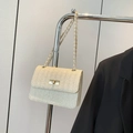 Cream woven chain bag with herringbone pattern and gold metal twist lock closure - Off White