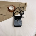 Mini crossbody bag in black and gray colorblock design with silver clasp and leather strap - Black & Blue