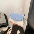 Sac à main chic contrasté bleu et crème avec boucle ronde et poignée élégante - Bleu