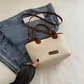 Elegante bolso de paja tipo cubo en beige y marrón con correa ajustable - Blanco Roto
