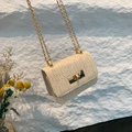 Cream woven straw flap crossbody bag with V-shaped texture and gold chain strap - Off White