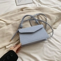 Light blue woven mini square bag with chunky rope strap and golden hardware - Blue