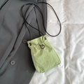 Minimalist light green nylon drawstring crossbody phone bag with thin black shoulder strap - Green