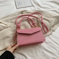 Chic pink woven textured flap bag with golden hardware and matching handles - Pink