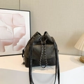Two-tone drawstring bucket bag in olive and black with chain strap detail - Black