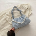 Light blue pleated shoulder bag with elegant pearl chain strap and silk texture - Blue