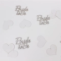 Sparkly Bride to Be table confetti with white heart shapes for bridal party decor - Silver Text + White Heart