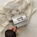 Mini borsa a tracolla argento con fiocco metallico e sottile catenina - Argento