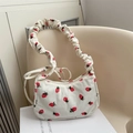Cream corduroy underarm bag with strawberry print and pleated cloud shoulder strap - White