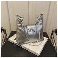 Detail of silver metallic ribbon bow on wrinkled texture shoulder bag with knot strap - Silver