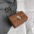 Deep brown quilted crossbody bag with silver twist lock and leather chain strap - Brown