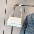White quilted flap bag with knotted shoulder strap and elegant golden metal hardware - White