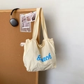 Beige washed canvas tote bag with blue Beach lettering for women casual commute - White