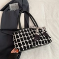 Chic black and white houndstooth tweed tote bag with a decorative spotted silk scarf - Black