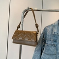 Elegant caramel quilted shoulder bag with geometric stitching and knotted strap detail - Brown