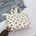 White corduroy tote bag with red strawberry print and casual dual top handles - Off White