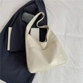 Chic off-white tote bag with geometric texture and spacious interior for daily commute - Off-white