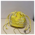 Detail of yellow drawstring bucket bag with colorful wavy patterns and chain strap - Yellow