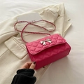 Rose pink quilted chain bag with silver bow accent and glossy finish for women - Rose Pink