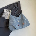 Light blue denim tote bag with colorful heart patches and stylish fashion lettering - Blue Without Charm