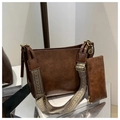 Detail of vintage brown leather bucket bag with geometric woven strap and small pouch - Dark Brown