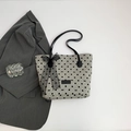 Light gray polka dot tote bag with black lace bow and leather straps on flat lay - Light Gray (Polka Dot Pattern)